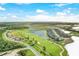 Golf course community with lake and homes at 14025 Black Beauty Dr # 412, Punta Gorda, FL 33955