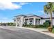Modern clubhouse exterior with landscaping at 14025 Black Beauty Dr # 412, Punta Gorda, FL 33955