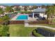Community pool with lounge chairs and gazebo at 14025 Black Beauty Dr # 412, Punta Gorda, FL 33955