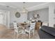 Charming dining area with round table and four chairs at 14025 Black Beauty Dr # 412, Punta Gorda, FL 33955