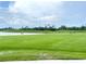 Driving range with lake view at 14025 Black Beauty Dr # 412, Punta Gorda, FL 33955