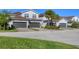 Three-unit building with attached garages and landscaping at 14025 Black Beauty Dr # 412, Punta Gorda, FL 33955