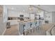 Modern kitchen with granite island, stainless steel appliances, and white cabinets at 14025 Black Beauty Dr # 412, Punta Gorda, FL 33955