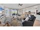 Open concept living room and kitchen with ample natural light at 14025 Black Beauty Dr # 412, Punta Gorda, FL 33955