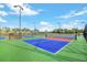 Enjoy outdoor recreation at these well-lit pickleball courts at 14025 Black Beauty Dr # 412, Punta Gorda, FL 33955