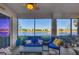 Relaxing screened lanai overlooking a lake with comfortable seating at 14025 Black Beauty Dr # 412, Punta Gorda, FL 33955