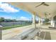 Covered seating area overlooking tennis courts at 14025 Black Beauty Dr # 412, Punta Gorda, FL 33955