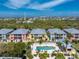 Aerial view showing community pool and surrounding buildings at 2002 Bal Harbor Boulevard # 811, Punta Gorda, FL 33950