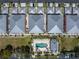 Directly above view of community pool and building rooftops at 2002 Bal Harbor Boulevard # 811, Punta Gorda, FL 33950