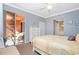Spacious bedroom with a queen bed, balcony access, and ample closet space at 2002 Bal Harbor Boulevard # 811, Punta Gorda, FL 33950