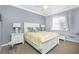 Bright bedroom with a queen-size bed and private access to the balcony at 2002 Bal Harbor Boulevard # 811, Punta Gorda, FL 33950