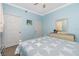 Light and airy bedroom with a full-size bed and neutral decor at 2002 Bal Harbor Boulevard # 811, Punta Gorda, FL 33950