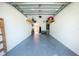 Neat and organized garage with overhead storage and bike at 2002 Bal Harbor Boulevard # 811, Punta Gorda, FL 33950