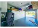 Spacious garage with overhead storage shelving and ample floor space at 2002 Bal Harbor Boulevard # 811, Punta Gorda, FL 33950