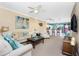 Spacious living room with comfortable seating and a view of the kitchen at 2002 Bal Harbor Boulevard # 811, Punta Gorda, FL 33950