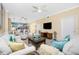 Open living room with comfortable seating and views into the kitchen area at 2002 Bal Harbor Boulevard # 811, Punta Gorda, FL 33950