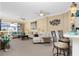 Spacious living room with comfortable sofas, a coffee table, and access to a patio at 2002 Bal Harbor Boulevard # 811, Punta Gorda, FL 33950