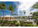 Community pool with surrounding tropical landscaping at 2002 Bal Harbor Boulevard # 811, Punta Gorda, FL 33950