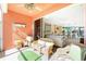 Comfortable screened porch with wicker furniture and view of living area at 2002 Bal Harbor Boulevard # 811, Punta Gorda, FL 33950