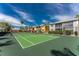 Community tennis court with surrounding landscape at 2002 Bal Harbor Boulevard # 811, Punta Gorda, FL 33950