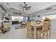 Bright dining area with table and chairs near the kitchen and living room at 222 Boundary Blvd # 222P, Rotonda West, FL 33947