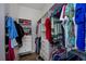 Well-organized closet with plenty of storage for clothing and accessories at 23177 Mcmullen Ave, Port Charlotte, FL 33980