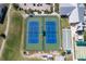 Aerial view of two tennis courts and bocce ball area at 24368 Westgate Blvd, Punta Gorda, FL 33980