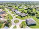 Community overview showcasing various houses and green spaces at 25475 Terrain Ln, Punta Gorda, FL 33983