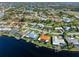 Aerial showcasing waterfront property and surrounding homes at 3014 Guadalupe Dr, Punta Gorda, FL 33950