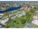 Aerial view showcasing the property's location in a waterfront community at 3014 Guadalupe Dr, Punta Gorda, FL 33950