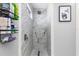 Clean and modern walk-in shower with marble tile at 3014 Guadalupe Dr, Punta Gorda, FL 33950