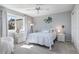 Bedroom with a full bed, white dresser and ocean-themed decor at 3014 Guadalupe Dr, Punta Gorda, FL 33950