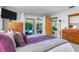 King bedroom with pool access, large TV and ample closet space at 3014 Guadalupe Dr, Punta Gorda, FL 33950