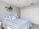 Guest bedroom with coastal decor and a comfortable bed at 3014 Guadalupe Dr, Punta Gorda, FL 33950