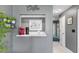 Small kitchen nook with coffee bar and built-in shelving at 3014 Guadalupe Dr, Punta Gorda, FL 33950