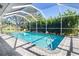 Inviting screened pool with ample deck space at 3014 Guadalupe Dr, Punta Gorda, FL 33950