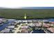 Wide aerial view showcasing waterfront property and neighborhood at 3936 Crooked Island Dr, Punta Gorda, FL 33950