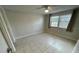 Spacious bedroom with tiled floors and large window at 4022 Beaver Ln # 800D, Port Charlotte, FL 33952