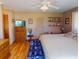 Main bedroom with king bed and access to backyard at 1015 Montana Ave, Englewood, FL 34223