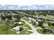 Aerial view showing home's location in a residential neighborhood at 112 Sunnyside Nw St, Port Charlotte, FL 33952