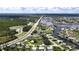Aerial view highlighting home's access to major roads and waterways at 112 Sunnyside Nw St, Port Charlotte, FL 33952
