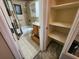 Bathroom with shower, toilet and linen closet at 112 Sunnyside Nw St, Port Charlotte, FL 33952