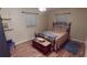 Cozy bedroom with a double bed and wood flooring at 112 Sunnyside Nw St, Port Charlotte, FL 33952