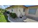 Home's exterior showcasing pool pump and equipment at 112 Sunnyside Nw St, Port Charlotte, FL 33952