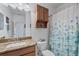 Small bathroom with shower/tub combo and granite vanity at 1153 Jonah Dr, North Port, FL 34289