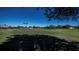 View of a peaceful golf course from afar at 1216 Rio De Janeiro Ave # 306, Punta Gorda, FL 33983