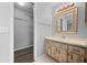 Bathroom with vanity, sink, and linen closet at 1327 Abscott St, Port Charlotte, FL 33952