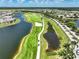 Aerial view of golf course and community at 15023 Black Cherry Way, Punta Gorda, FL 33955