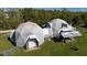 Aerial view of two connected geodesic dome homes at 15871 Huffmaster Rd, North Fort Myers, FL 33917