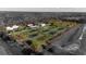 Aerial view of property with unique dome homes and a large lot at 15871 Huffmaster Rd, North Fort Myers, FL 33917